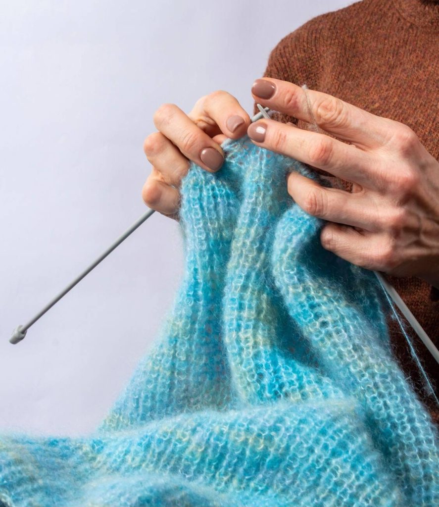 What is the process of knitting?